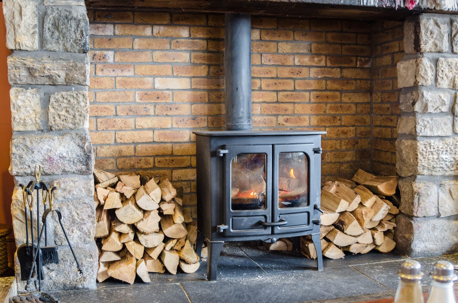 Can you burn pine in a wood stove and how safe is it?