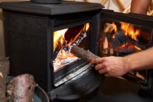 Wood burning stove with blower