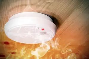 how to deactivate first alert smoke alarm